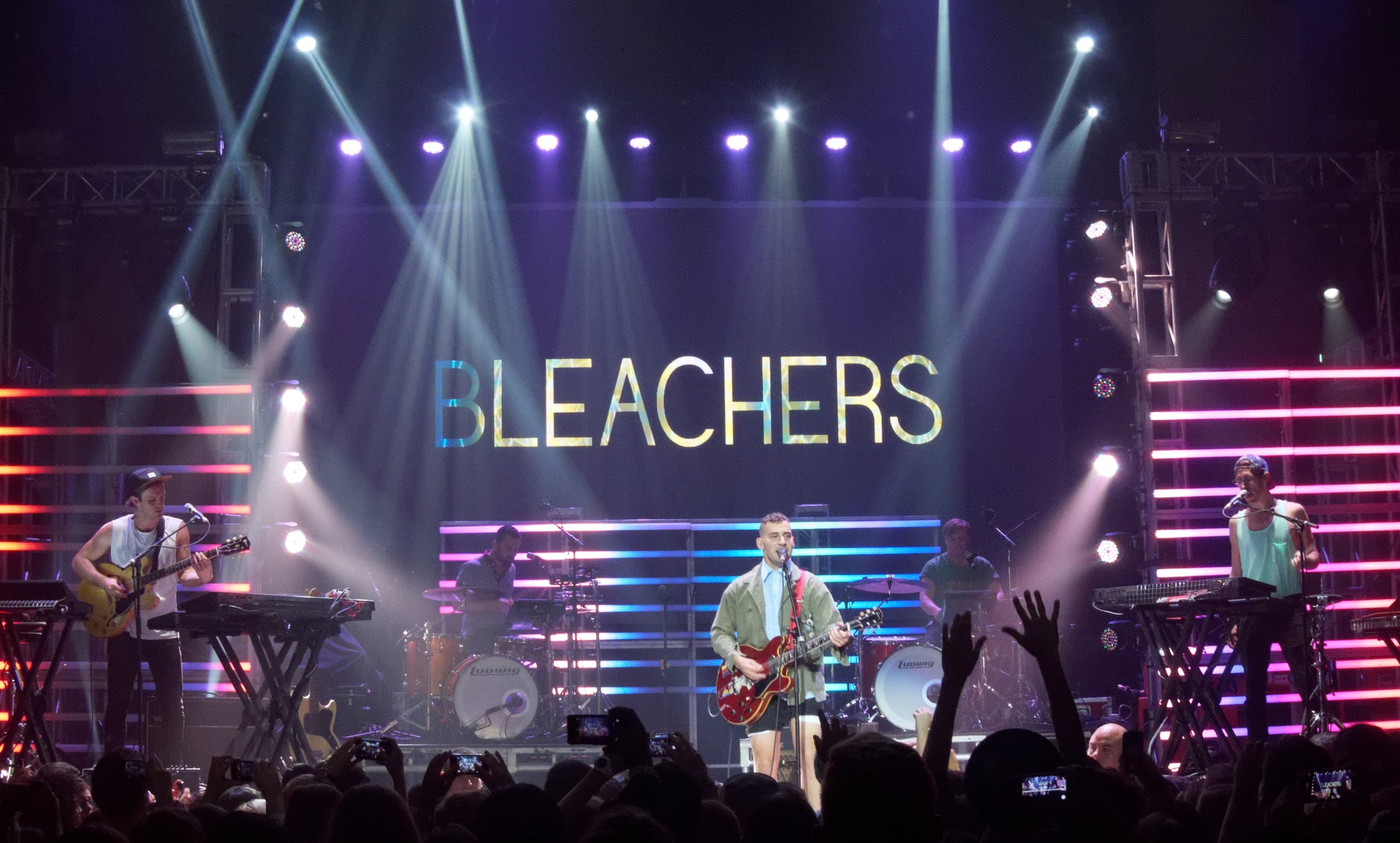 Bleachers performing live on stage